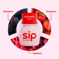Sip Elixirs Wild Berry Sleep bottle surrounded by blackberries, strawberries, and raspberries on a white background.